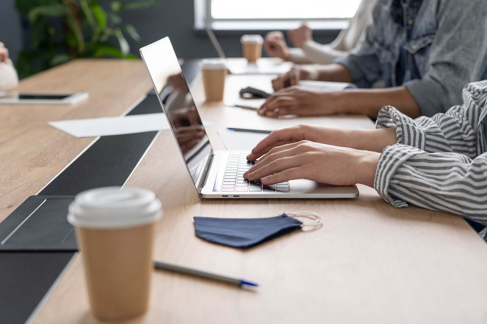 people-working-while-respecting-social-distancing-restriction